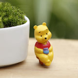 Miniature  Winnie The Pooh On A Chair