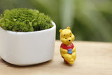 Miniature  Winnie The Pooh On A Chair